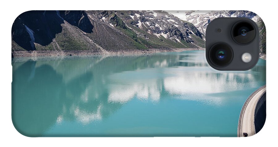 Adventure iPhone 14 Case featuring the photograph View of the Stausee Mooserboden glacier dam by Vaclav Sonnek