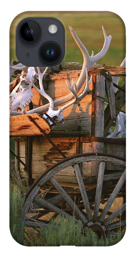 Legacies iPhone 14 Case featuring the photograph Legacies -Wagon Wheel and Antler Horns - Montana by Bonnie Colgan