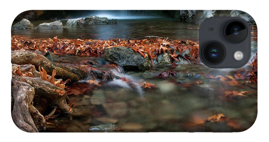 Troodos iPhone Case featuring the photograph Waterfall and river flowing with maple leaves on the rocks on the river in Autumn by Michalakis Ppalis
