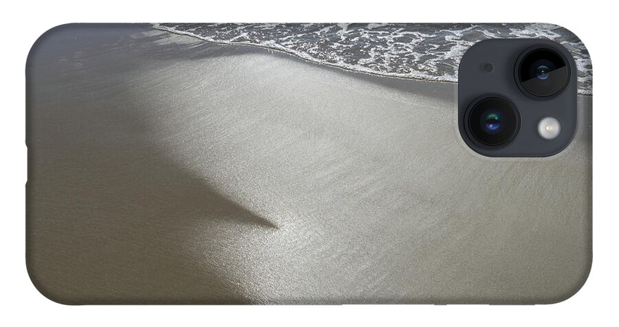 Sandy Beach iPhone Case featuring the photograph Wet sand, sea water and reflections of sunlight by Adriana Mueller