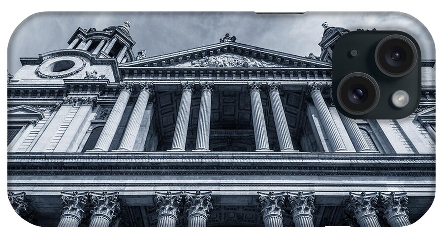 Britain iPhone Case featuring the photograph The columns of St Paul's Cathedral west facade from Ludgate Hil by Peter Noyce