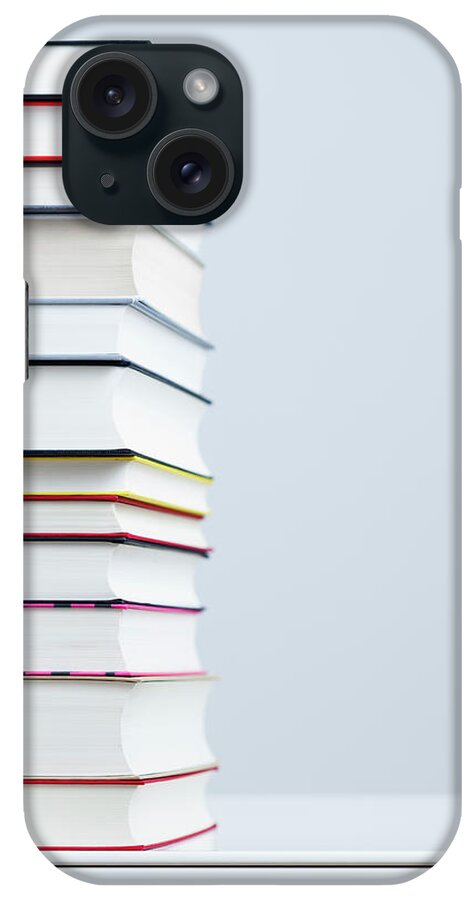 Large Group Of Objects iPhone Case featuring the photograph A Stack Of Books #1 by Jorg Greuel