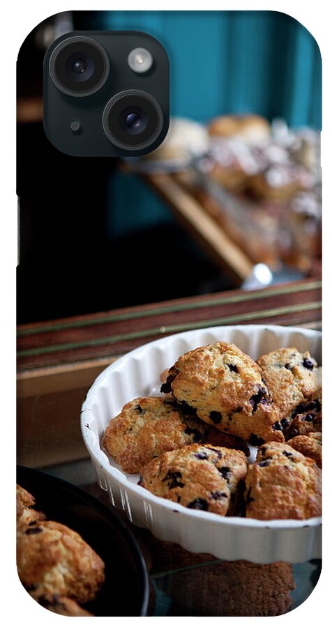 Breakfast iPhone Case featuring the photograph A Variety Of Scones For Sale On Display #1 by Halfdark
