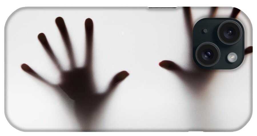 Hands iPhone Case featuring the photograph Hands touching frosted glass #1 by Michal Bednarek