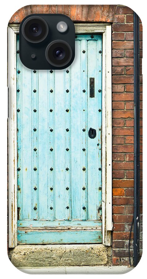 Abstract iPhone Case featuring the photograph Old blue door #1 by Tom Gowanlock