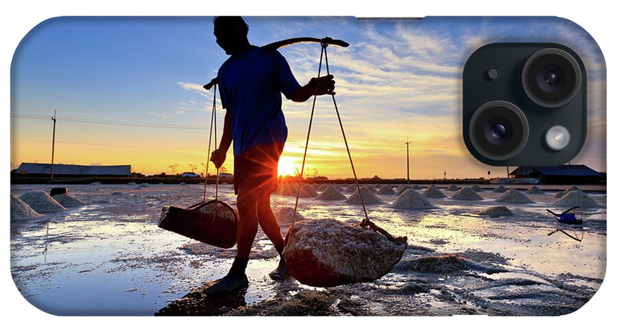 Working iPhone Case featuring the photograph Salt Farm Worker Thailand #1 by Monthon Wa