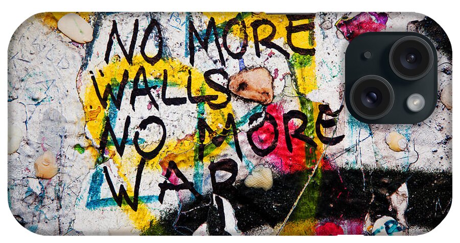 Berlin iPhone Case featuring the photograph Part of Berlin Wall with graffiti and chewing gums #2 by Michal Bednarek