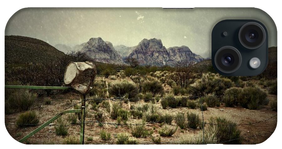 Rusted iPhone Case featuring the photograph A Bucket And A Fence by Mark Ross