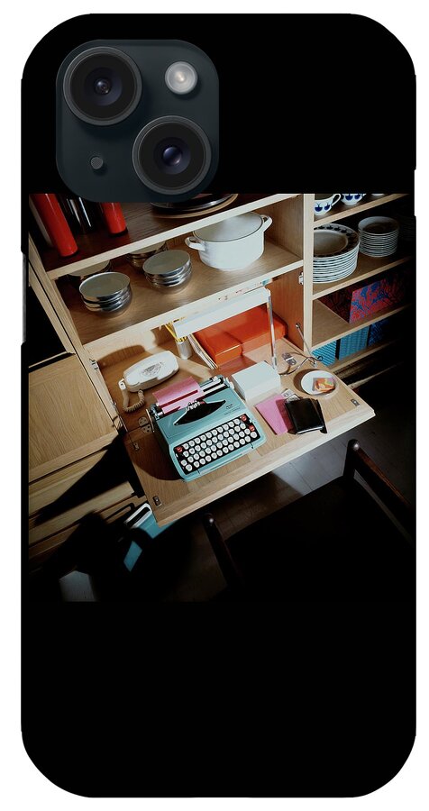 A Cupboard With A Blue Typewriter iPhone Case