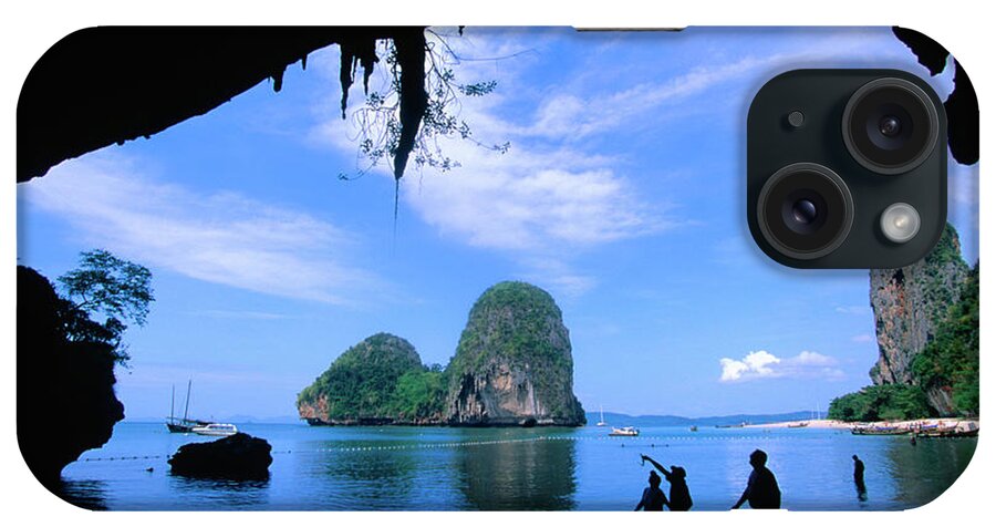 Southeast Asia iPhone Case featuring the photograph A Group Of People Explore The Rocky by John Elk