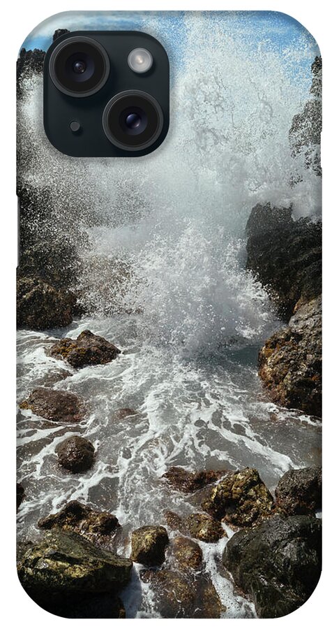 Extreme Terrain iPhone Case featuring the photograph A Wave Crashing And Splashing Against by Philip Rosenberg / Design Pics