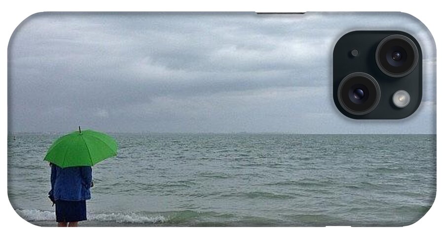  iPhone Case featuring the photograph Alone At The Beach On A Stormy Day by Troy Thomas