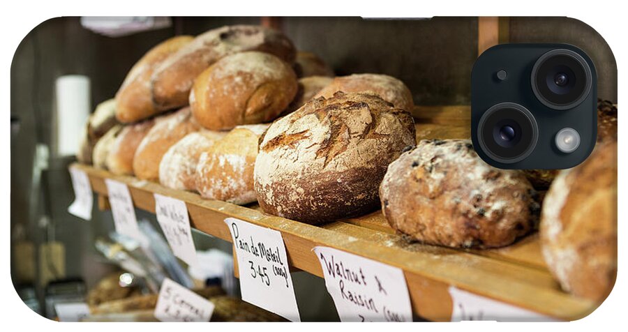 Bakery iPhone Case featuring the photograph Artisan Bread On Shelves In Bakery by Betsie Van Der Meer