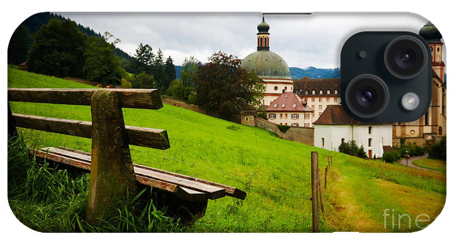 Bench iPhone Case featuring the photograph Bench overlooking a historic monastery by Nick Biemans