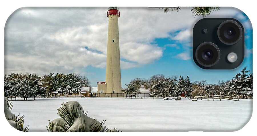 Beacon iPhone Case featuring the photograph Cape May Light thru Snowy Trees by Nick Zelinsky Jr