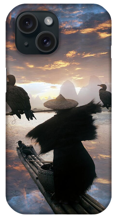 Tranquility iPhone Case featuring the photograph Chinese Fisherman With Cormorant by Buena Vista Images