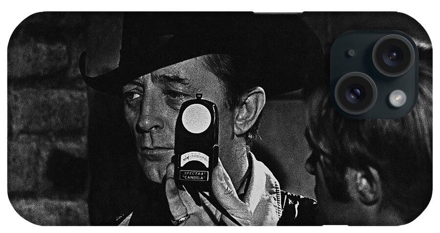 Cinematographer Harry Stradling Jr. Getting Light Reading Robert Mitchum Young Billy Young Set Old Tucson Arizona 1968 iPhone Case featuring the photograph Cinematographer Harry Stradling Jr. getting light reading Robert Mitchum Young Billy Young set 1968 by David Lee Guss
