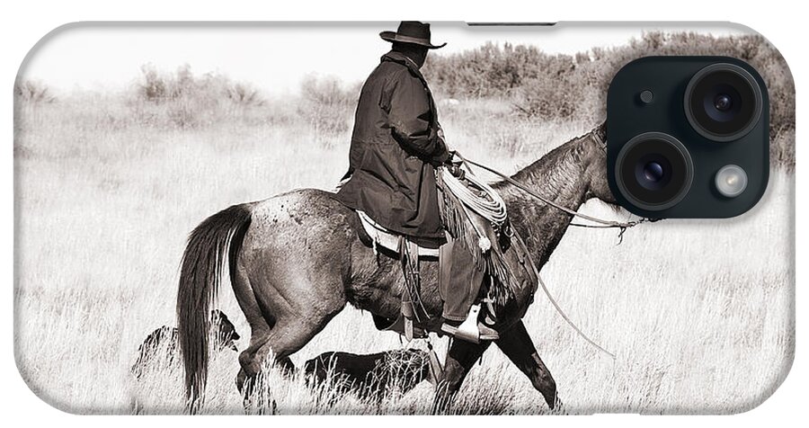Cowboy iPhone Case featuring the photograph Cowboy and Dogs by Cindy Singleton