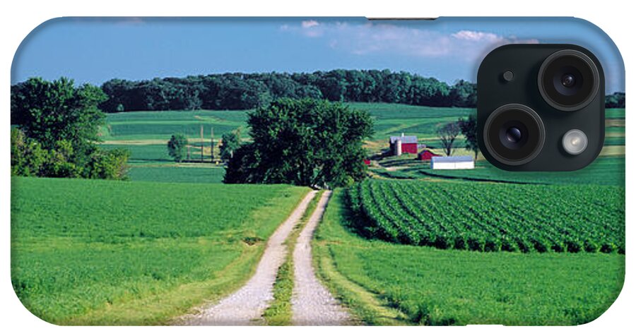 Photography iPhone Case featuring the photograph Dirt Road Passing Through A Farm by Panoramic Images