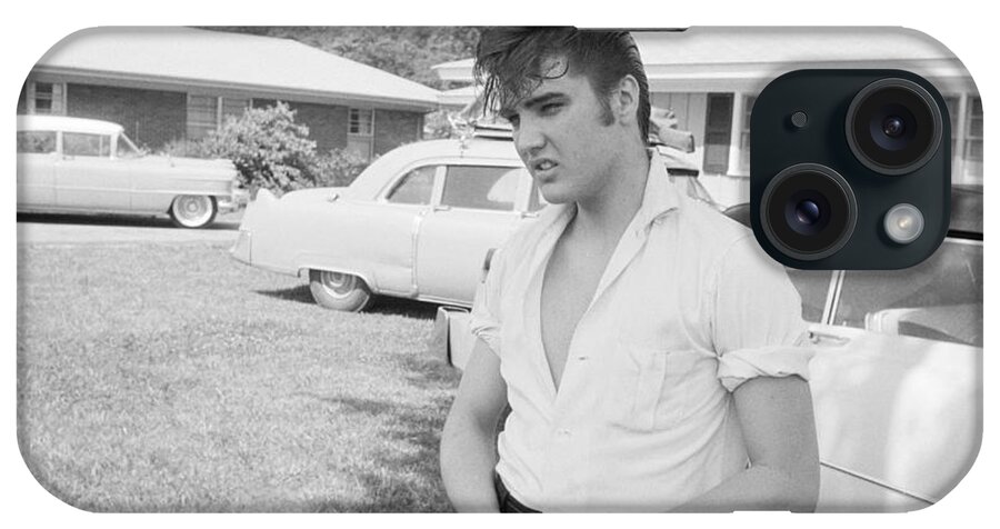 Elvis Presley iPhone Case featuring the photograph Elvis Presley with his Cadillacs by The Harrington Collection