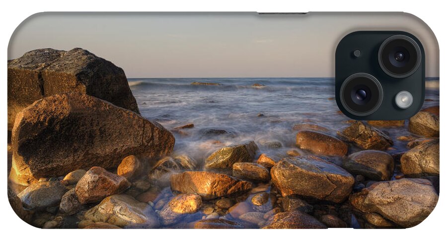 Montauk iPhone Case featuring the photograph Evening glow at the shore by Steve Gravano