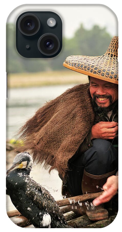 Chinese Culture iPhone Case featuring the photograph Fisherman And His Cormorant On Li River by Huang Xin