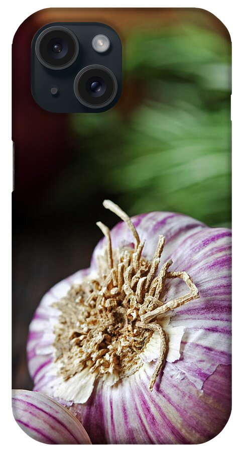 Wood iPhone Case featuring the photograph Garlic And Vegetables On A Rustic by John W Banagan