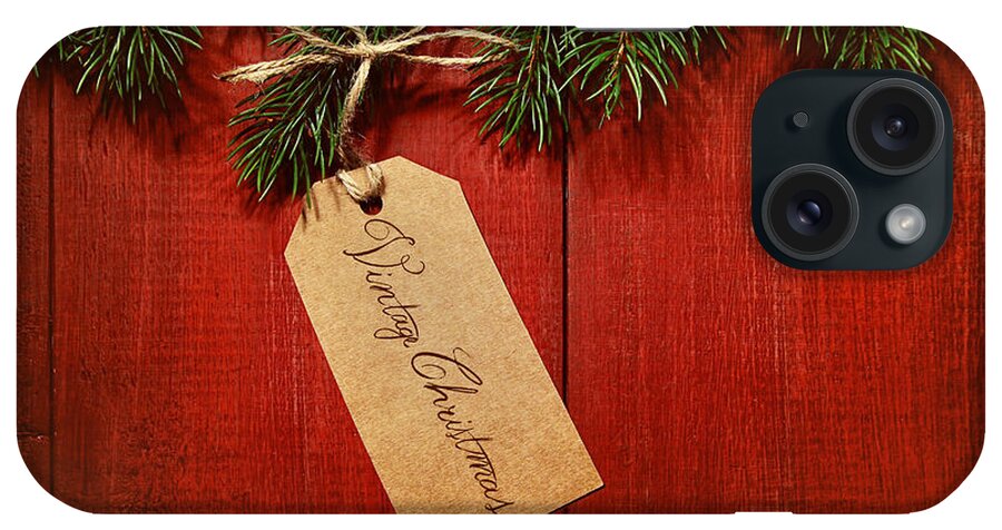 Gift iPhone Case featuring the photograph Gift tag on red wood background by Sandra Cunningham
