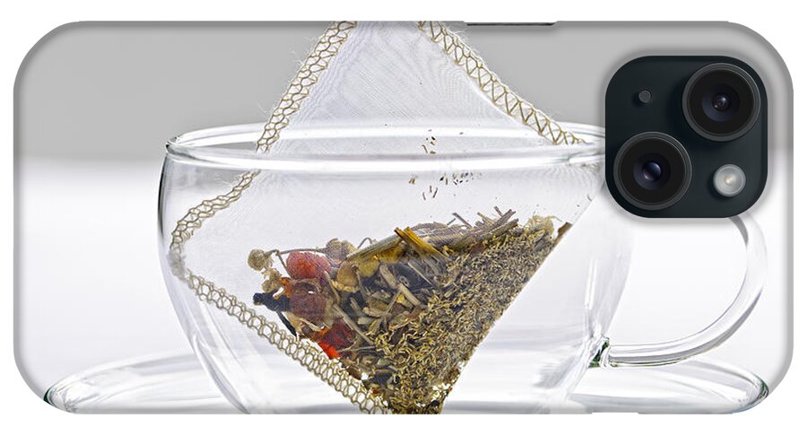 Tea iPhone Case featuring the photograph Herbal tea bag in cup by Elena Elisseeva