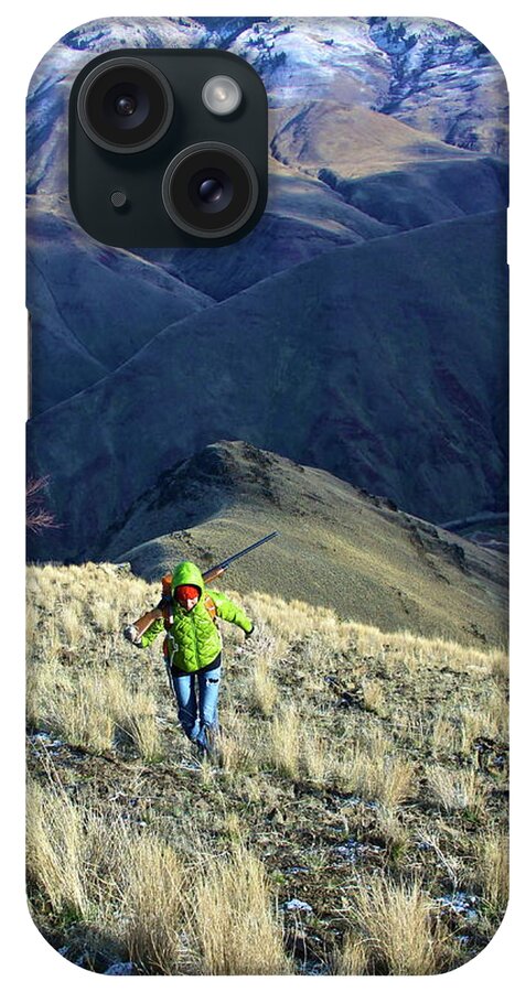 Grass iPhone Case featuring the photograph Hunter Climbing Steep Hillside by Jillian Lukiwski
