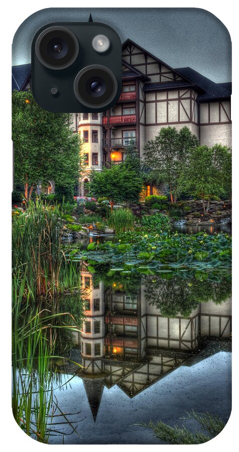 The Inn At Christmas Place iPhone Case featuring the photograph Inn the Reflection by Greg and Chrystal Mimbs