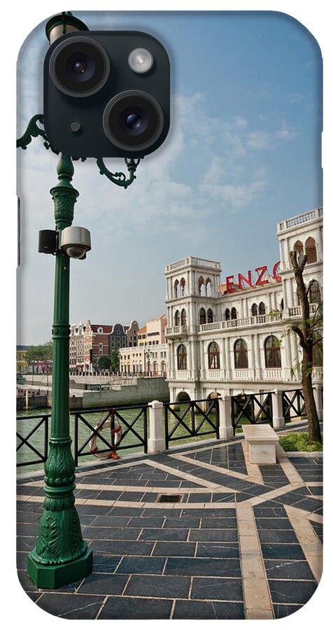Macao iPhone Case featuring the photograph Lampost With Palace In Venetian Style by Manfred Gottschalk