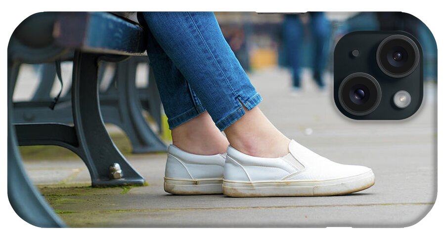 Sneakers iPhone Case featuring the photograph Legs Of A Girl In A Summer Town Dressed In Sneakers by Wladimir Bulgar/science Photo Library