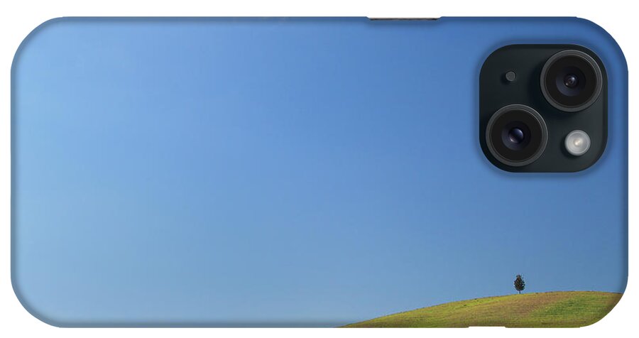 Scenics iPhone Case featuring the photograph Lone Tree In Tuscany by Maurice Ford