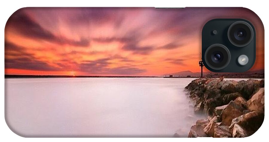  iPhone Case featuring the photograph Long Exposure Sunset Shot At A Rock by Larry Marshall