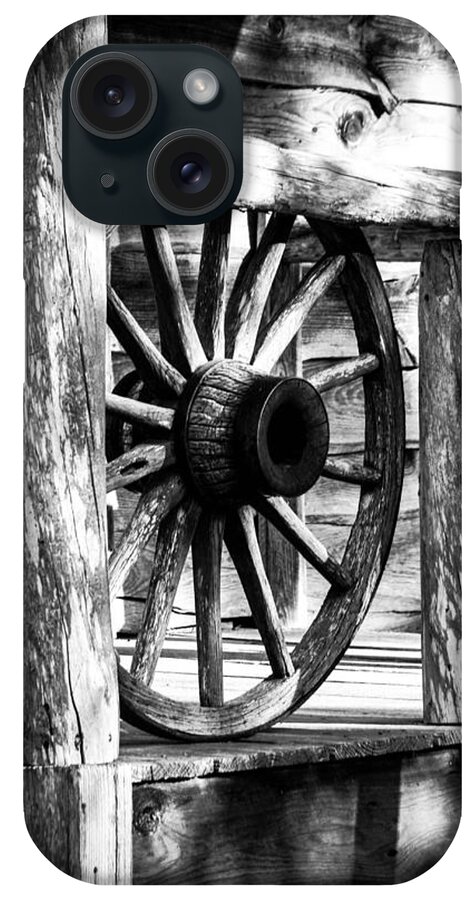 Rural iPhone Case featuring the photograph Old Wagon Wheel by Debra Forand