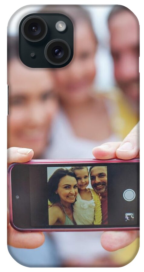 35-39 Years iPhone Case featuring the photograph Parents Taking Family Photograph by Ian Hooton