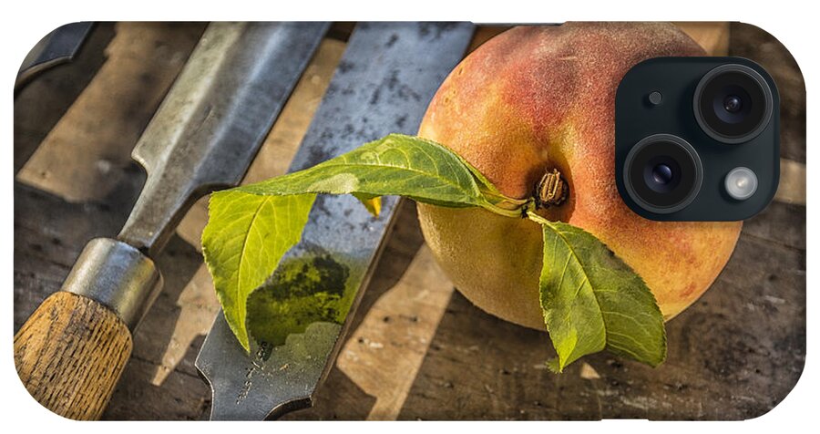 Luscious iPhone Case featuring the photograph Peach on a Workbench by Terry Rowe