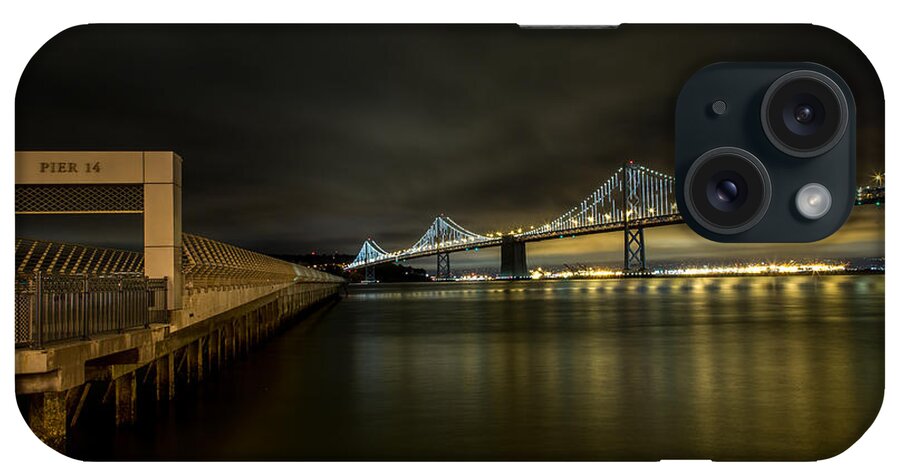 San Francisco iPhone Case featuring the photograph Pier 14 and Bay Bridge at Night by John Daly