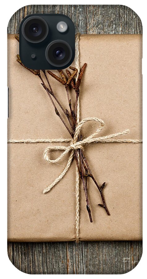Package iPhone Case featuring the photograph Plain gift with natural decorations by Elena Elisseeva