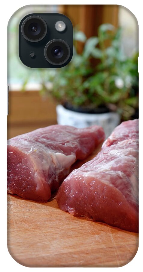 German Food iPhone Case featuring the photograph Raw Pork Fillet On Table by Westend61