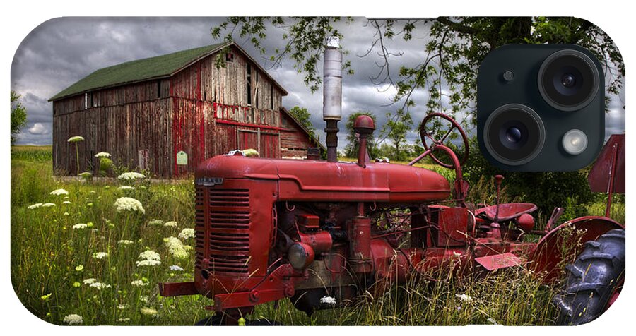 Tractor iPhone Case featuring the photograph Reds in the Pasture by Debra and Dave Vanderlaan