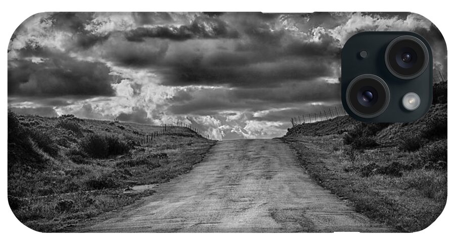 Clouds And Road iPhone Case featuring the photograph Road to Nowhere by David Waldrop