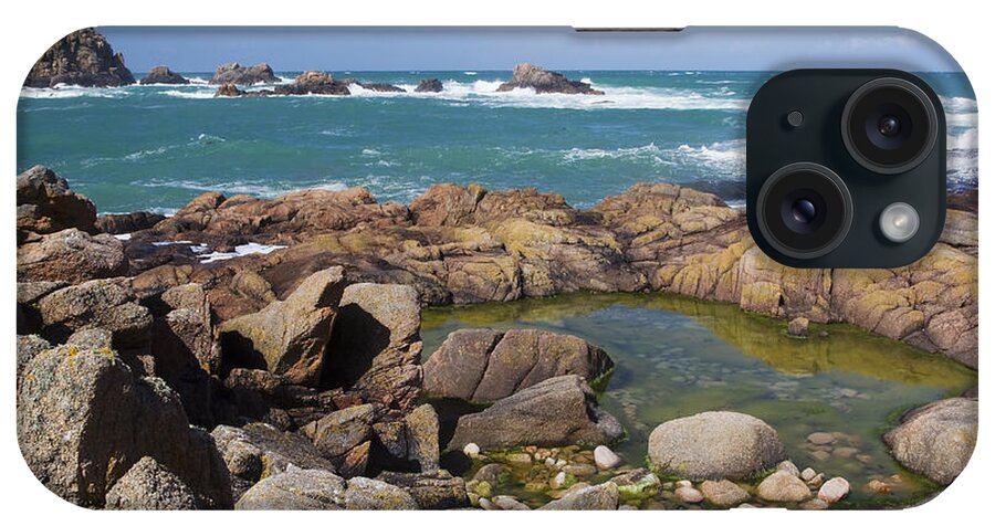 Flpa iPhone Case featuring the photograph Rocky Shore And La Corbiere Lighthouse by Bill Coster