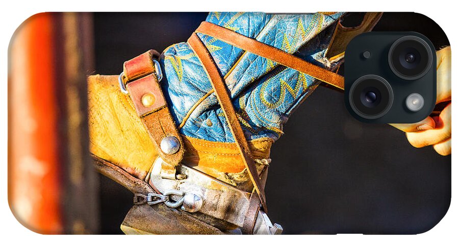 Steven Bateson iPhone Case featuring the photograph Rodeo Boot Tie Down by Steven Bateson