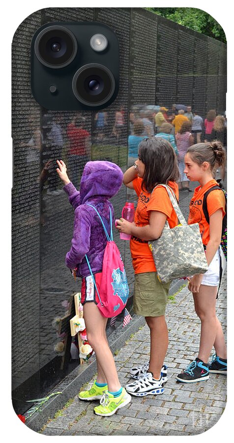 Vietnam Veterans Memorial iPhone Case featuring the photograph Searching a loved Ones Name on the Vietnam Veterans Memorial by Jim Fitzpatrick
