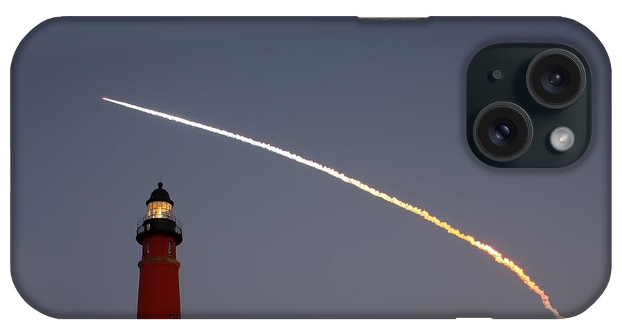 Space iPhone Case featuring the photograph Shuttle Discovery liftoff over Ponce Inlet Lighthouse by Paul Rebmann