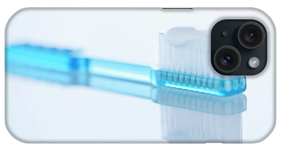 Toothbrush iPhone Case featuring the photograph Studio Shot Of Toothbrush by Daniel Grill