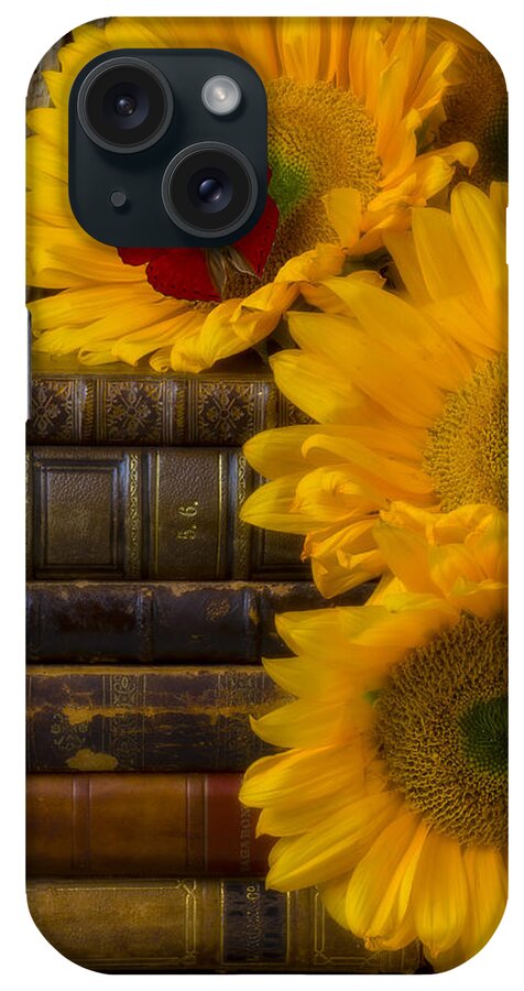 Sunflowers iPhone Case featuring the photograph Sunflowers and old books by Garry Gay
