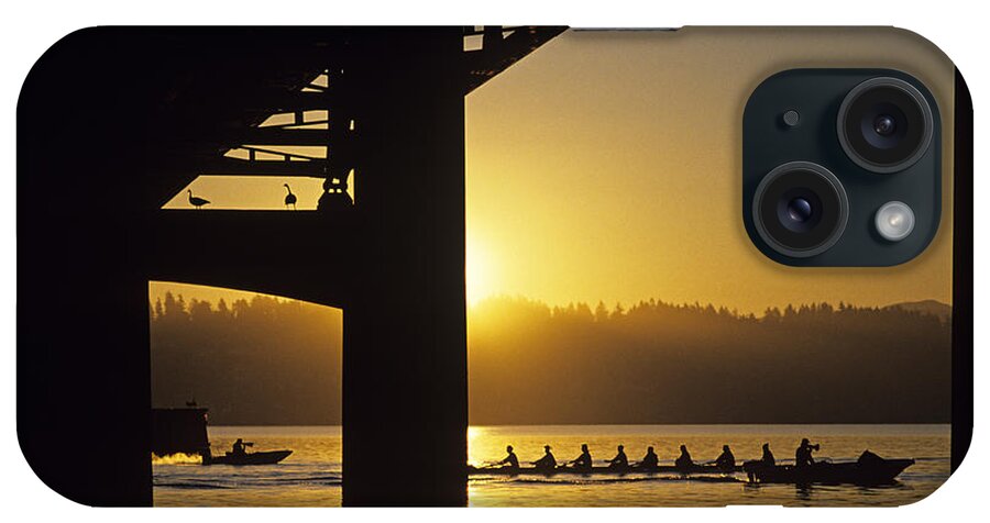 Athletics iPhone Case featuring the photograph Sunrise on Lake Washington below bridge with eight woman crew by Jim Corwin